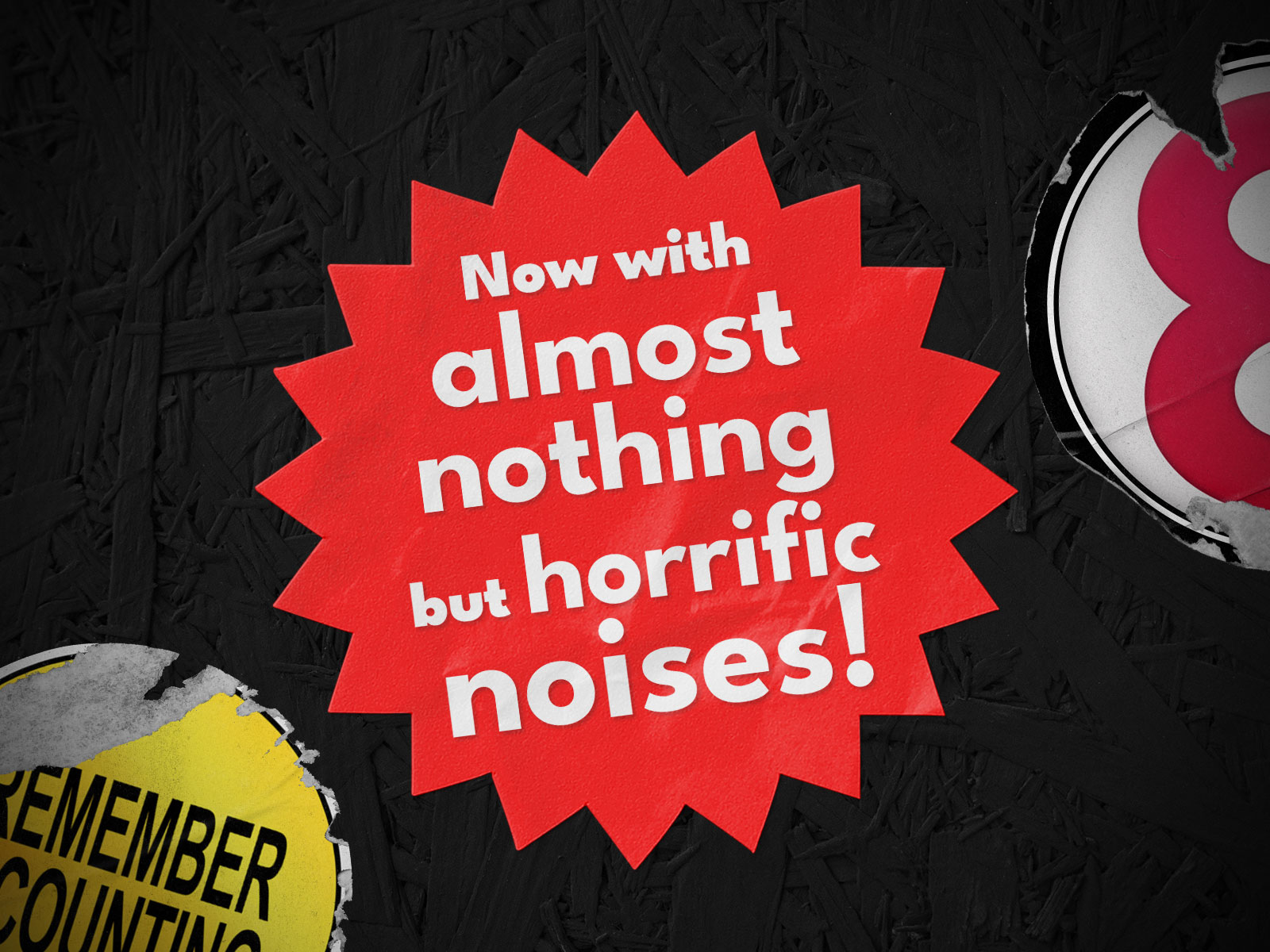 Close-up of a red star sticker that says 'Now with almost nothing but horrific noises!'